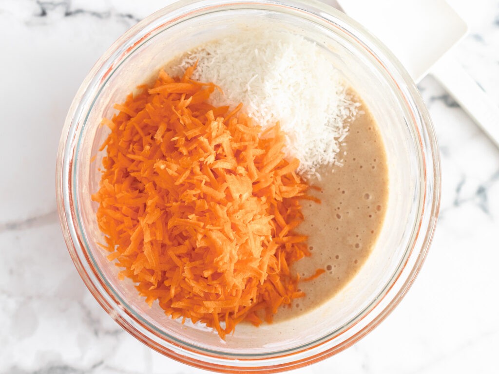 Carrot Cake batter with coconut and shredded carrots